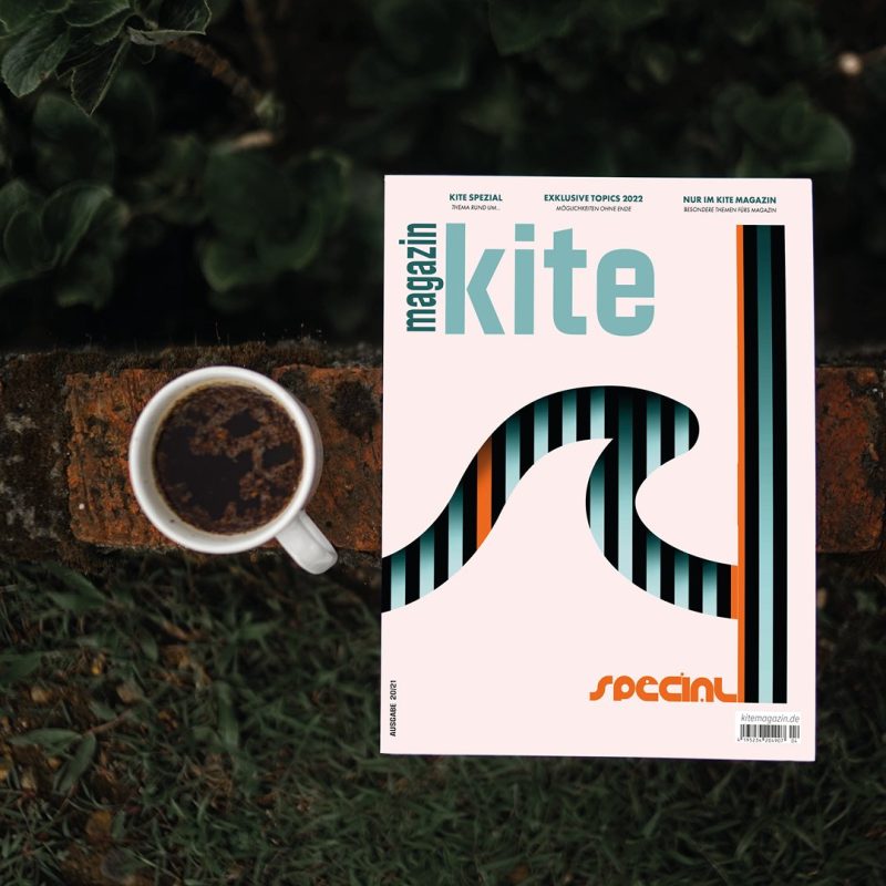 Picture shows a cover design of the kite magazine which is placed in the nature